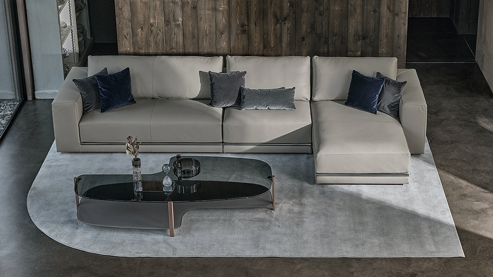 Divano in pelle con penisola Pitagora di Bontempi